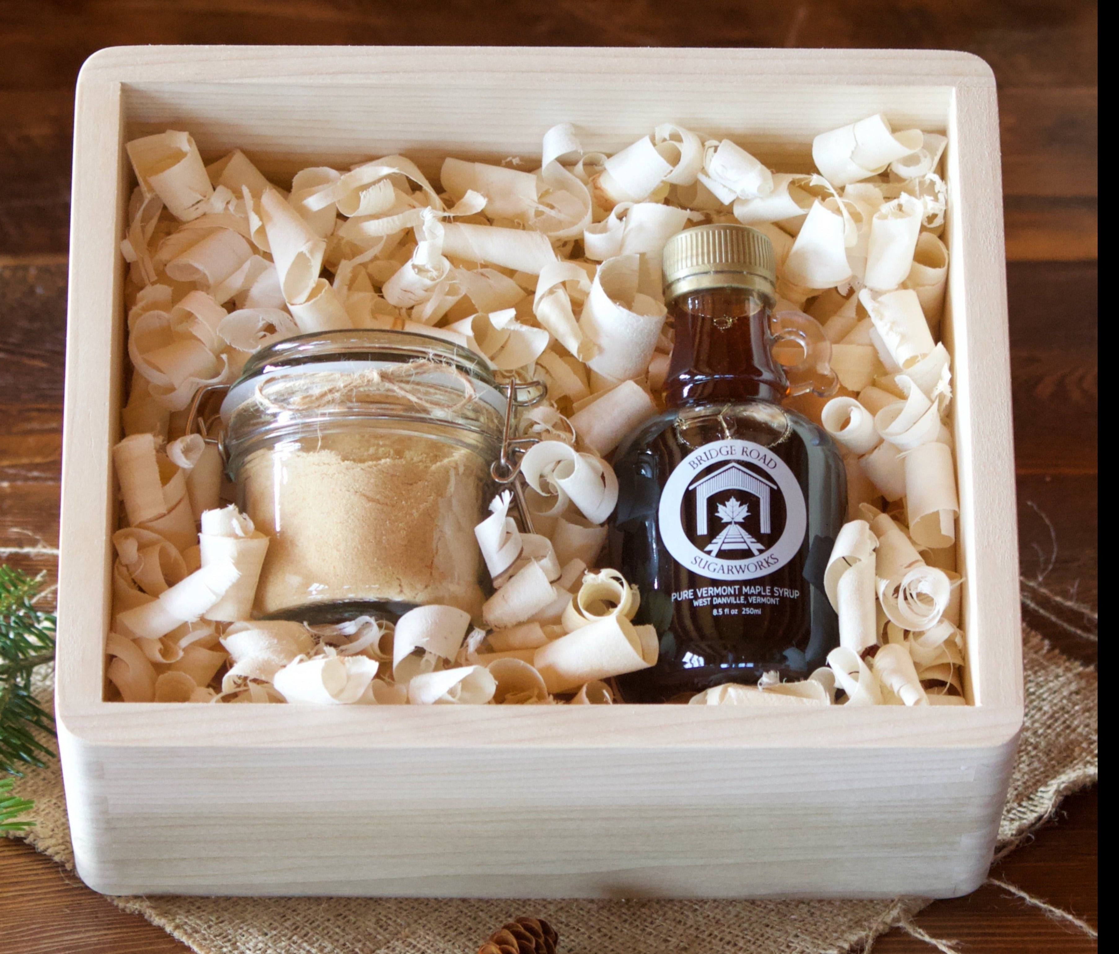 Maple syrup and sugar in a wooden box